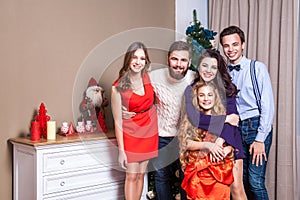 Picture showing happiness family, celebrating christmas at home.