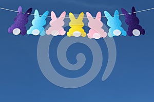 Easter festoon in front of the blue sky