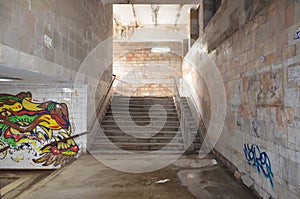 A graffiti with underpass stairs