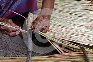 Picture shows how to make a panel vetiver for hut roof, handwork crafts of panel vetiver for hut roof, straw roof hut