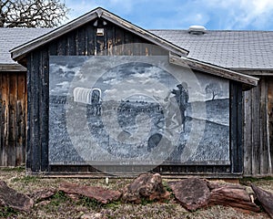 Picture on the side of the The Boundary Restaurant at Route 66 and the Indian Meridian in Luther, Oklahoma.