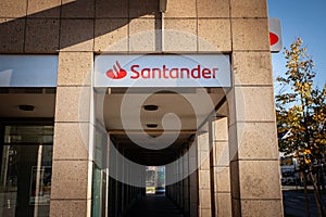 DORTMUND, GERMANY - NOVEMBER 11, 2022: Logo of Santander Bank on their local office in Dortmund. Banco Santander is a spanish