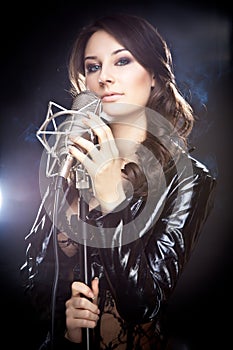 Picture of singer with studio microphone