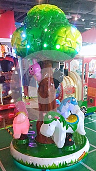 A picture of small merry go round at kids play ground