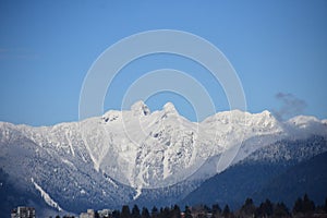 A picture of snow covered Lion`s Mountain.