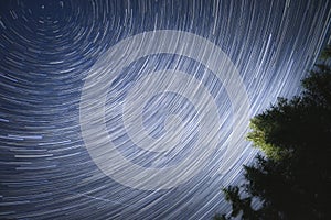 A picture of star trails of the night sky.  Valemont BC Canada