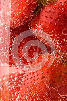 Picture of strawberries in glass with water