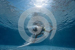 Picture of Surfing a Wave.Under Water Picture.