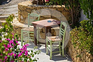 Picture of table and chairs. Cafe at the Greek street