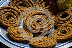 Picture of traditional festival snacks of India Chakali, Popular homemade salty and spicy snacks