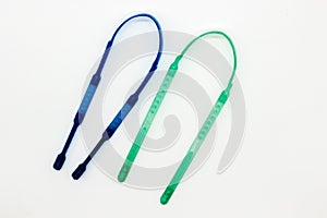 A picture of tungue cleaner isolated on white background