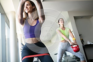 Picture of two fitness women in gym