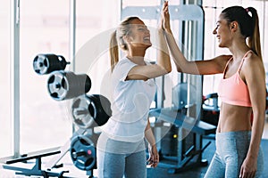 Picture of two fitness women in gym