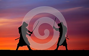 Picture with two samurais and sunset sky