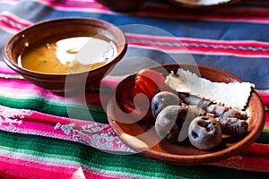 Typical meal with peruvian food, Amantani Island, Titicaca lake, Peru photo