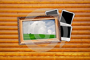 Picture in Vintage Frame with Blank Photos on Wood