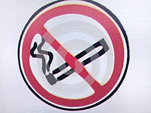 This picture is a warning sign are prohibited from smoking in the  area