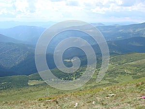 picture was taken from the mountain Goverla. The photo view of the clouds and the Carpathian Mountains