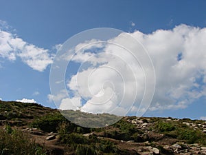 picture was taken from the mountain Goverla. The photo view of the clouds and the Carpathian Mountains