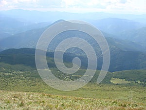 picture was taken from the mountain Goverla. The photo view of the clouds and the Carpathian Mountains