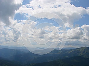 picture was taken from the mountain Goverla. The photo view of the clouds and the Carpathian Mountains