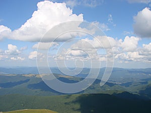 picture was taken from the mountain Goverla. The photo view of the clouds and the Carpathian Mountains