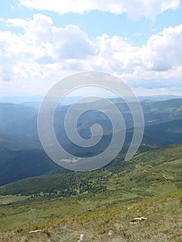 picture was taken from the mountain Goverla. The photo view of the clouds and the Carpathian Mountains