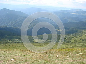 picture was taken from the mountain Goverla. The photo view of the clouds and the Carpathian Mountains