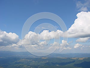 picture was taken from the mountain Goverla. The photo view of the clouds and the Carpathian Mountains