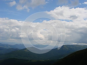 picture was taken from the mountain Goverla. The photo view of the clouds and the Carpathian Mountains