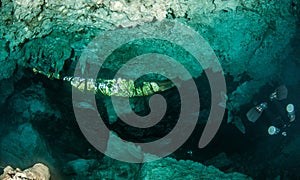 Scuba diving in the Cenote Dos Ojos, Mexico photo