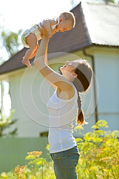 Picture of woman holding baby on arms