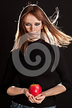 Picture of woman holding a red apple