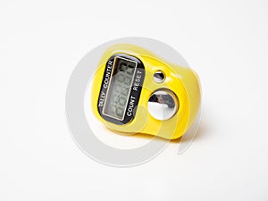 Picture of a yellow digital tally counter