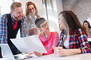 Picture of young architects discussing in office