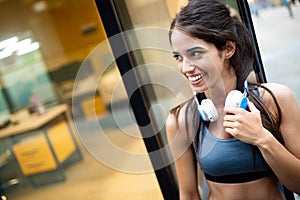 Picture of young attractive happy fitness woman