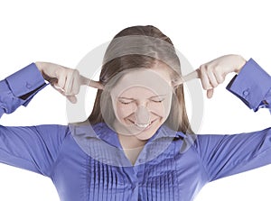 Picture of young woman with fingers in ears