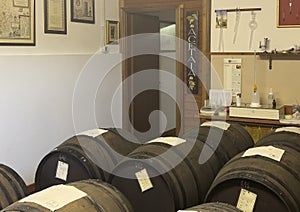 Aging barrels for production of Denomination of Controlled Origin balsamic vinegar at Acetaia Dei Bago in Modena, Italy.