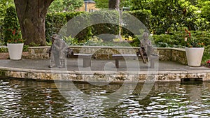 Bronze sculpture of a boy and old man fishing by Gary Price at the Dallas Arboretum and Botanical Garden