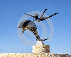 `Boy on a Dolphin` by David Wynne in front of Grayson College, Denison Campus, Texas.