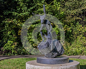 Thinker on a Rock by Barry Flanagan in the gardens of the Philbrook Museum of Art in Tulsa, Oklahoma.