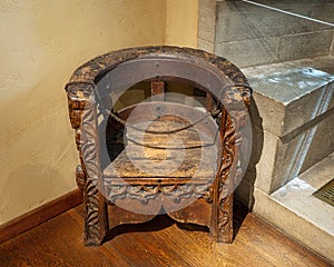 `Chair`, a 15th century pine, walnut and limewood piece of furniture on display in the Cloisters in New York City.