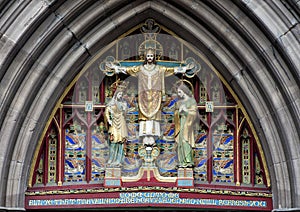 Pictured a closeup view of `Christ in Majesty`, above front door of Saint Mark`s Episcopal Church, Philadelphia, Pennsylvania