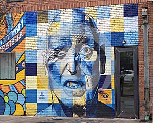 Mural honoring Rawlins Gilliland by Steve Hunter on the side of a building in Deep Ellum in Dallas, Texas