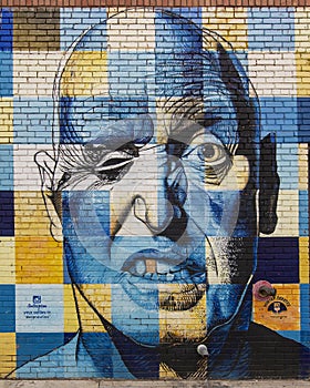 Mural honoring Rawlins Gilliland by Steve Hunter on the side of a building in Deep Ellum in Dallas, Texas photo