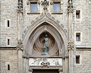 Detail of the secondary entrance of Basilica de Santa Maria del Mar with Saint Mary surrounded by a pointed arch, Barcelona, Spain photo
