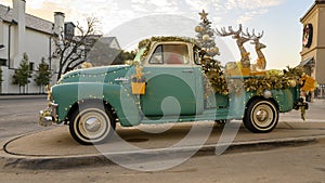 1953 GMC pickup truck with rare hydramatic transmission fully decorated for Christmas on display in Dallas, Texas