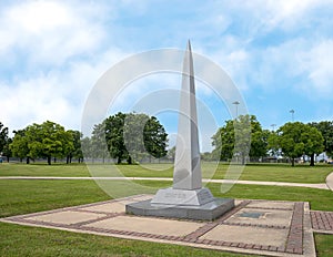 Granite obelisk memorial honoring all Veterans in Vandergriff Park in the City of Arlington, Texas.