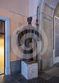 Iron Sculpture of Saint Benedict by sculptor Enric Monjo in the Atrium of the Basilica at Santa Maria de Montserrat Monastery. photo