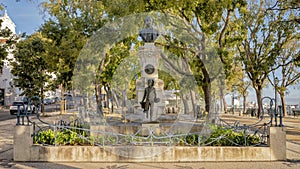 Monument to Eduardo Coelho, founder of the popular newspaer Diario de Noticias in 1864, located in Lisbon, Portugal. photo